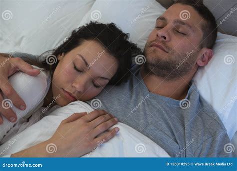 Couple Sleeping on Bed in Bedroom Stock Image - Image of clothing ...
