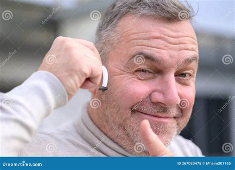 Hard Of Hearing Preteen Boy Playing Guitar Outdoors. Child With Hearing ...