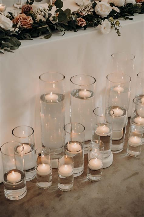 Vases + Floating Candles Wedding Centerpieces