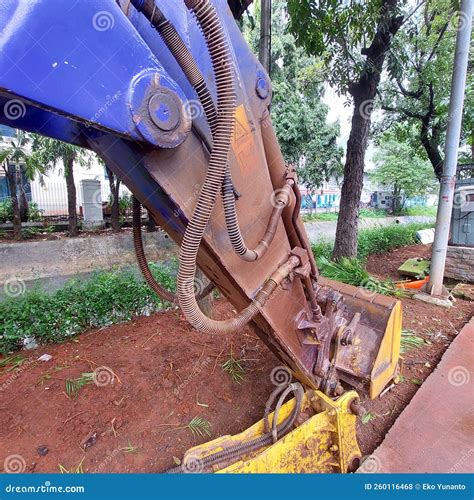 Excavator Heavy Equipment for Digging and Leveling the Ground Stock Photo - Image of statue ...