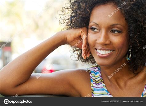 Beautiful mature woman smiling. Stock Photo by ©pixelheadphoto 183327576