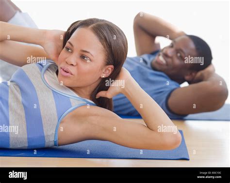 Exercising on mats hi-res stock photography and images - Alamy
