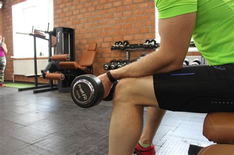 Seated One-Arm Dumbbell Palms-Up Wrist Curl — how to do it, video of ...