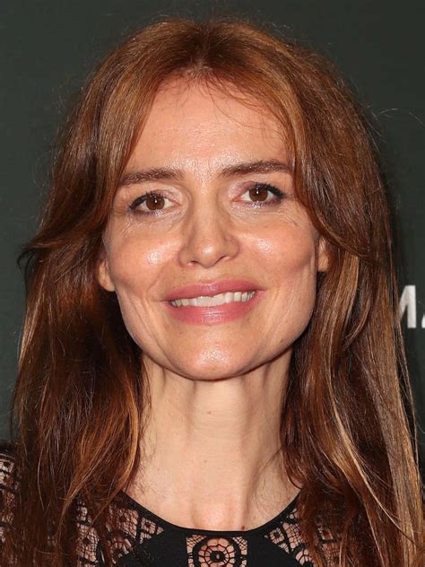 Download Saffron Burrows Radiant in Red Wallpaper | Wallpapers.com