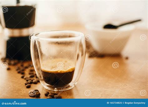 Hot Espresso in Glass Cup, Roasted Coffee Beans, Grounded Coffee ...