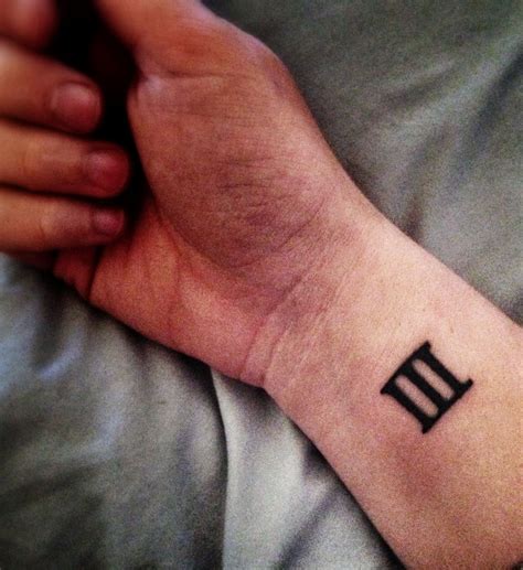 3 Roman Numeral Tattoo