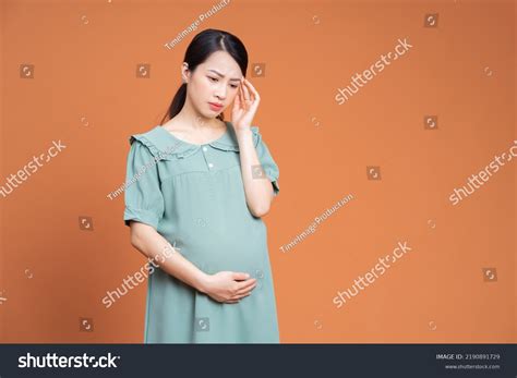 1,950 Asian Pregnant Woman Belly Pain Images, Stock Photos & Vectors ...