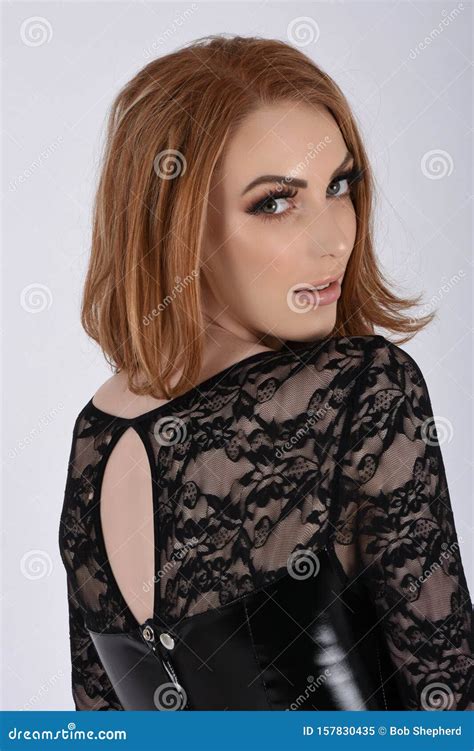 Sexy, Busty Redhead in Short, Tight Latex Dresses Stock Image - Image ...