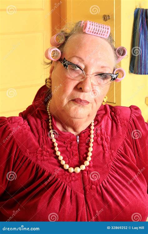 Grumpy Senior Granny with Curlers Stock Photo - Image of gramma, glasses: 32869252