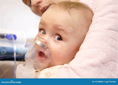 Baby with nebulizer mask stock photo. Image of medication - 14140800