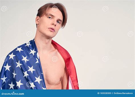 Brutal Young Caucasian Guy with a Naked Torso and an American Flag ...