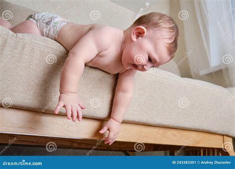 Infant Baby Falls Off the Sofa in the Home Living Room. Toddler Kid ...