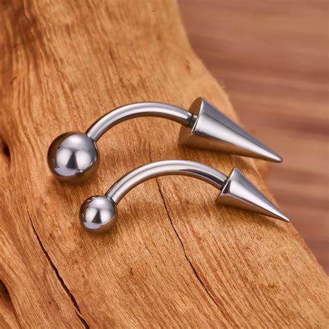 Angel fangs piercing with a long spike and a ball angel bites fangs 16 ...