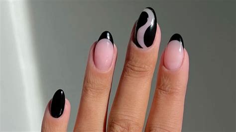 Gothic black French nails are trending as the emo alternative to Vanilla Girl manicures | Glamour UK