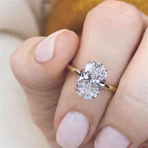 Oval Engagement Ring On Gold Band at Christy Calvin blog