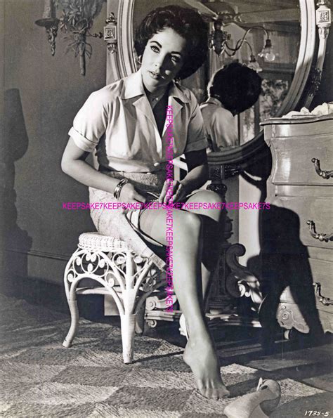 ELIZABETH TAYLOR ADJUSTING HER NYLON STOCKINGS BAREFOOT LEGGY TOES ...