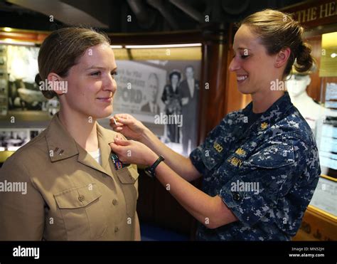 NORFOLK, Va. (***) -- Lt. Sara Nash is pinned to her new rank ...