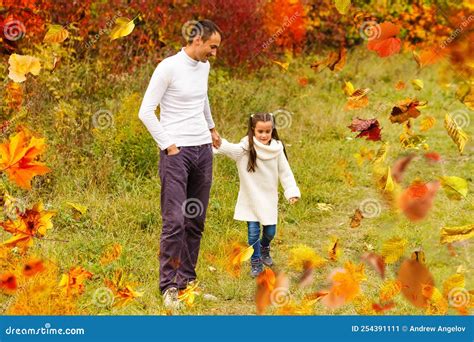Happy Family Father and Child Daughter on a Walk in the Autumn Leaf Fall in Park Stock Image ...