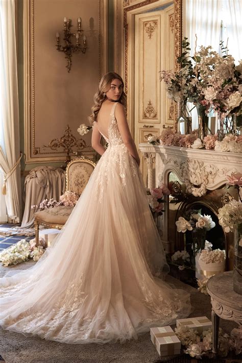 44406: Slim Tulle Ball Gown with Plunging V-Neckline and Lace Appliqués | Sincerity Bridal