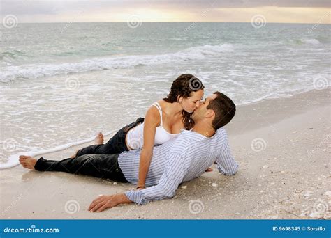 Woman Seducing Man on Beach at Sunset Stock Image - Image of attached ...