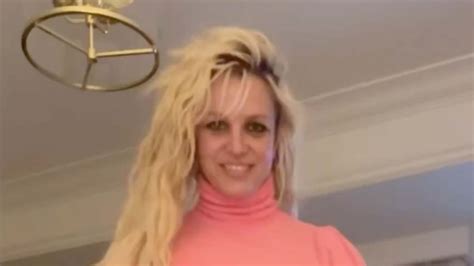 Britney Spears goes braless and nearly pulls down her underwear as she shows off wild dance ...