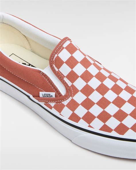 Classic Slip-On Checkerboard Shoes in Orange| Vans UK