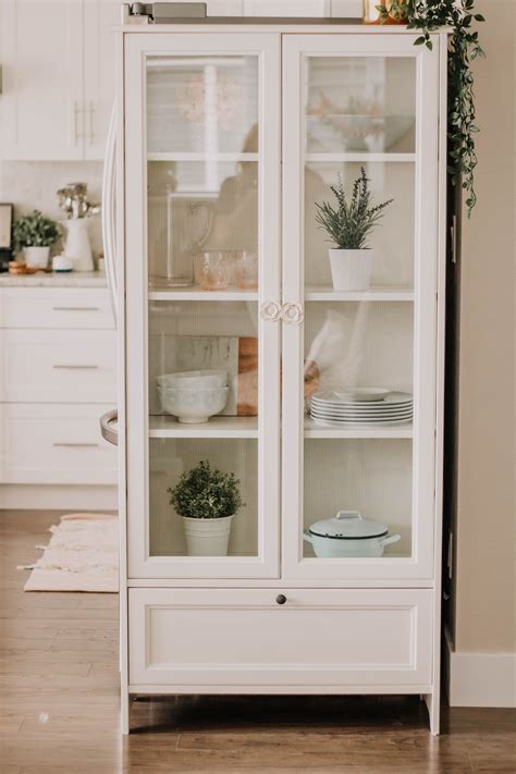 White Ikea Cabinet with Glass Doors for Chic Kitchen Display