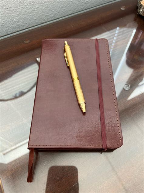 Simple leather bound notebook and my favorite Pentel Energel pen. : r ...