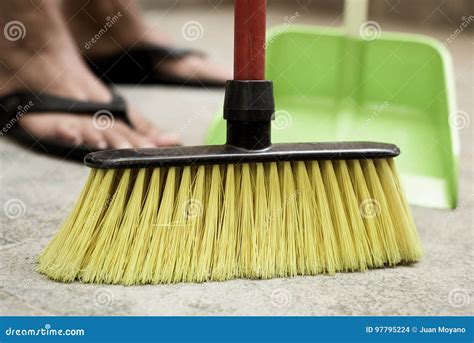 Young Man Sweeping the Floor with a Broom Stock Photo - Image of ...