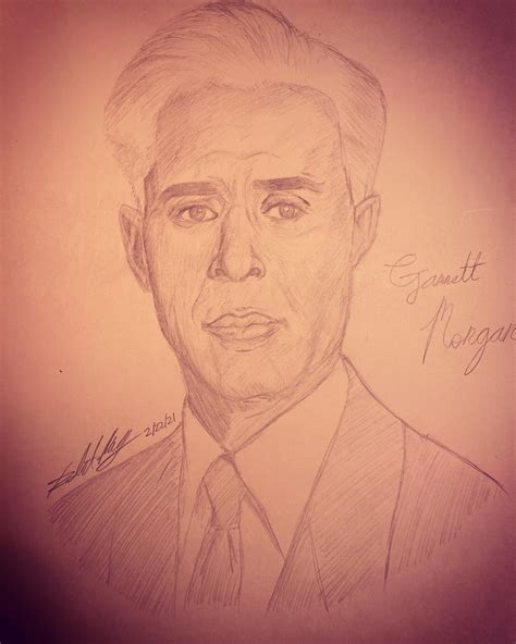 Garrett Morgan, the inventor of the gas mask, and the three positioned ...