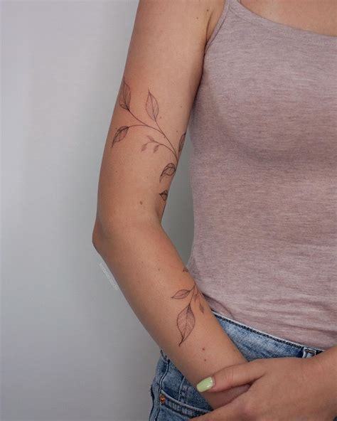 Floral Wrap Around Arm Tattoo at Mabel Singer blog