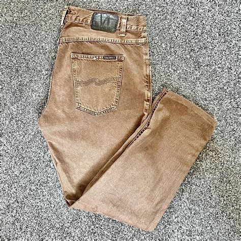 Nudie Jeans Men's Brown Jeans | Depop