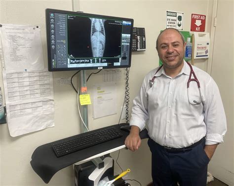 NEWLY REOPENED PALM SPRINGS ANIMAL HOSPITAL, DR. PETER HENEIN AND JOHN ...