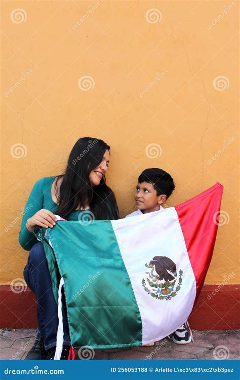 Latin Mexican Mom and Son Show the Flag of Mexico Very Proud of Their ...