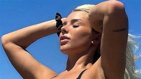 Glamorous footballer Madelene Wright shows off her curves in tiny bikini sending fans into ...