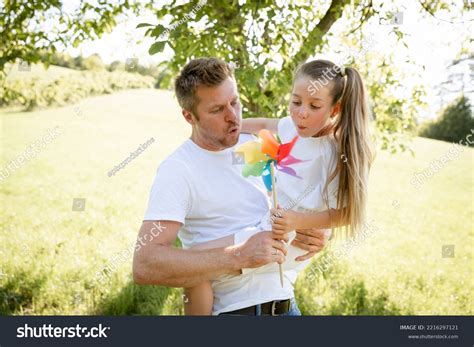 Father Daughter Cuddle Have Fun Outside Stock Photo 2216297121 ...