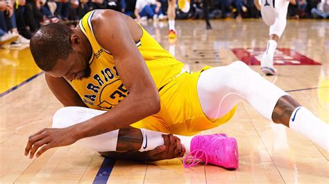 Kevin Durant injures ankle as Suns rally to stun Warriors