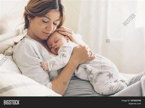 Loving Mom Carying Her Image & Photo (Free Trial) | Bigstock