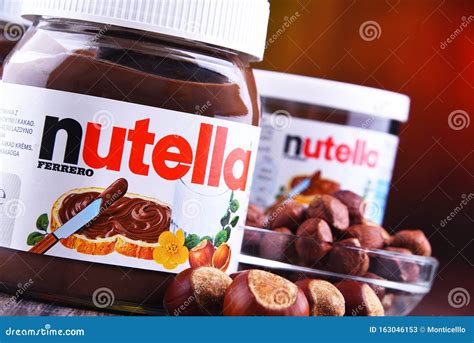 Jars of Nutella spread editorial stock photo. Image of palm - 163046153