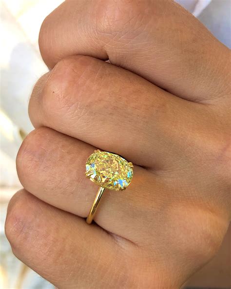 Fancy Yellow Oval Diamond Solitaire Ring – Ascot Diamonds