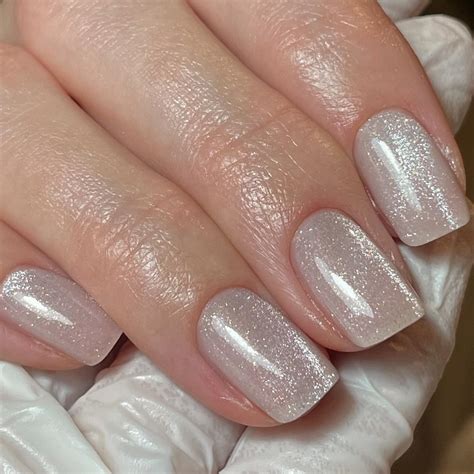 22+ Coolest White Cat Eye Nail Ideas (2025) - DrExplains