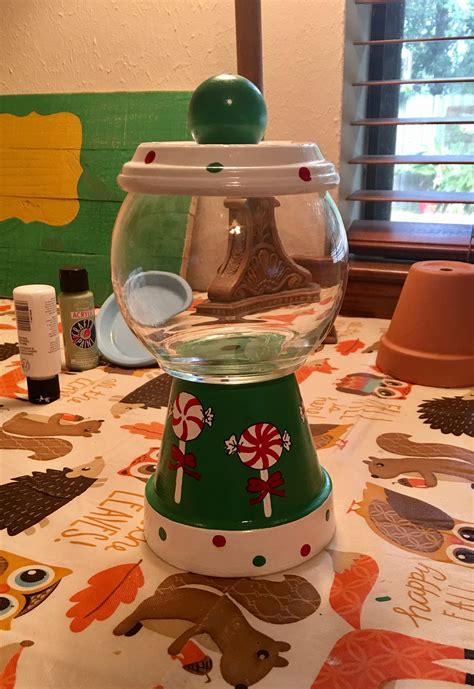 Peppermint lollipop terra cotta pot candy jar | Christmas candy jars ...