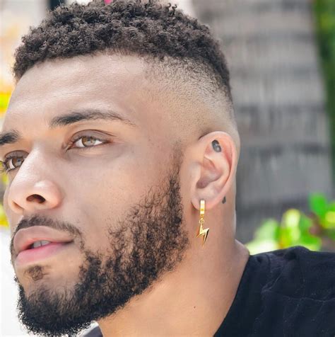 17 Best Men’s Ear Piercings: Top Styles and Types in 2026 | FashionBeans