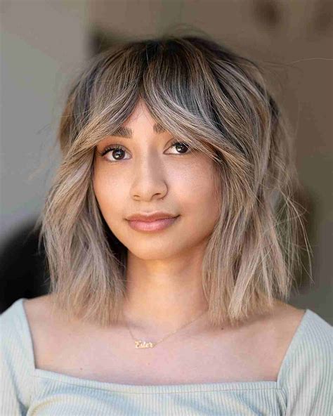 28 Shaggy Bob with Bangs Haircut Ideas for The Modern, Retro Girl