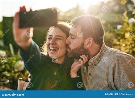 Love, Couple and Selfie on a Patio by Happy People Kiss, Bond and Relax ...