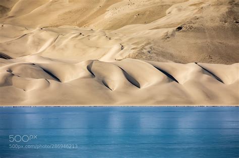 Sand Dunes and Water in the Desert