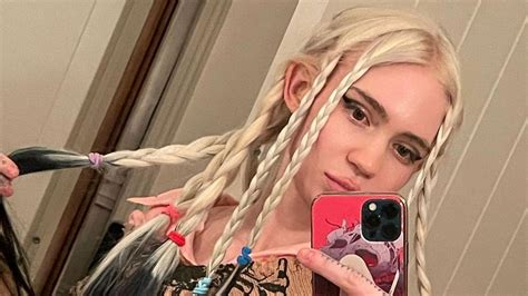What did Grimes do to her face? Before and after pictures go viral as new look leaves internet ...
