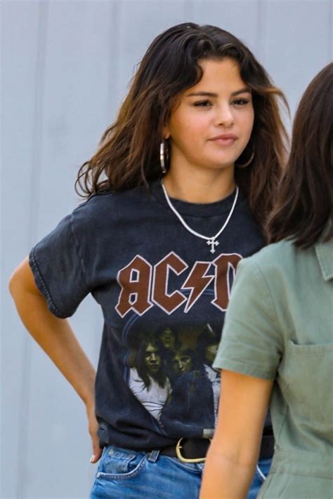 Selena Gomez in Jeans and AC/DC T-Shirt • CelebMafia