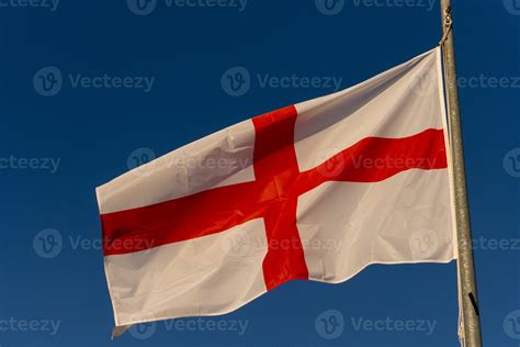 waving english flag red cross on white isolated on blue 18806354 Stock ...