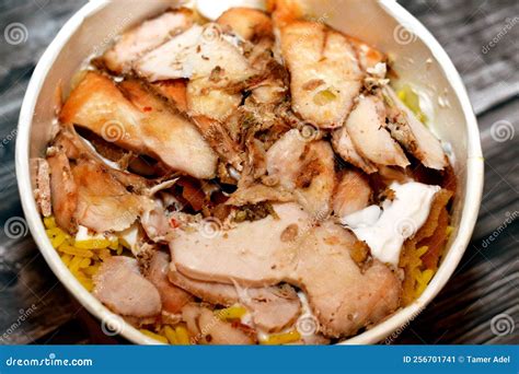 Pieces of Chicken Shawarma with Yellow Basmati Rice, Syrian Bread and ...